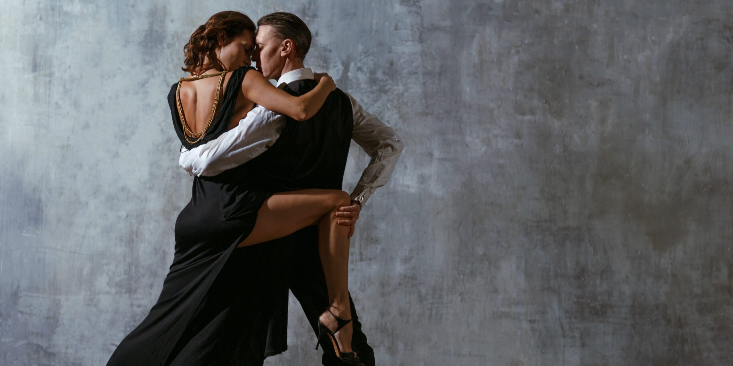 A man and woman holding each other