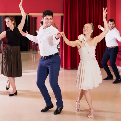 Two couples dancing